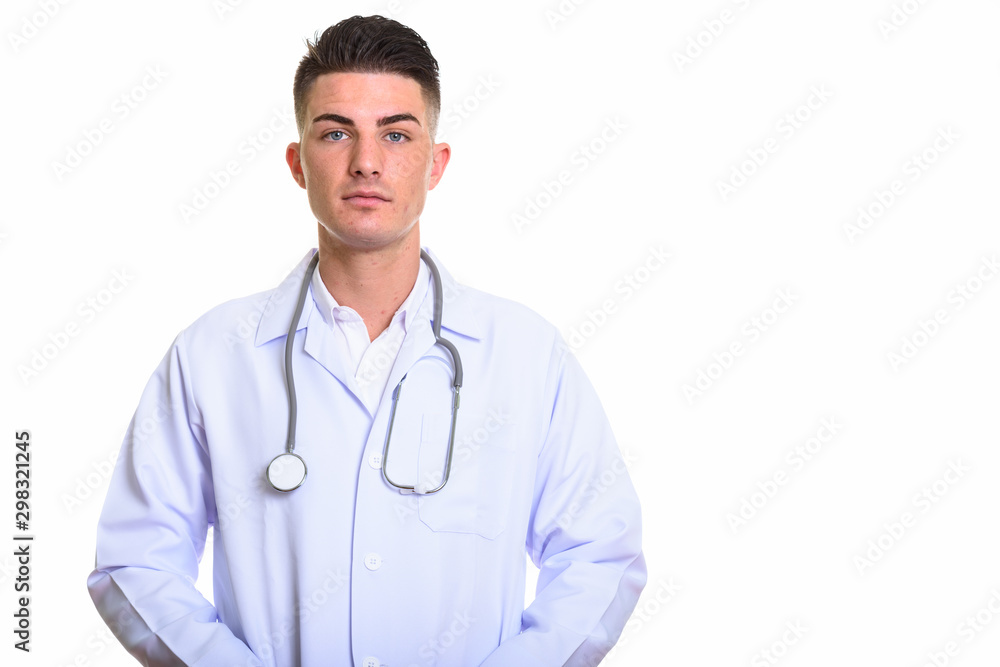 Studio shot of young handsome man doctor Studio shot of young handsome man doctor