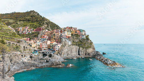 Panoramic view of old town Manarola in Riomaggiore, Italy