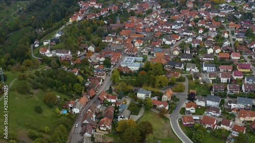 Aerial view of the city  Loffenau in Germany  on a cloudy day in autumn, fall. Zoom in on the town center. photo