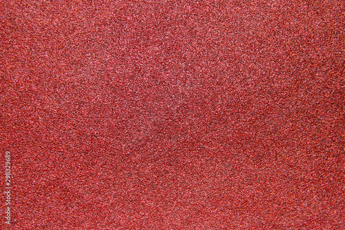 A texture of a coarse grit sandpaper photo