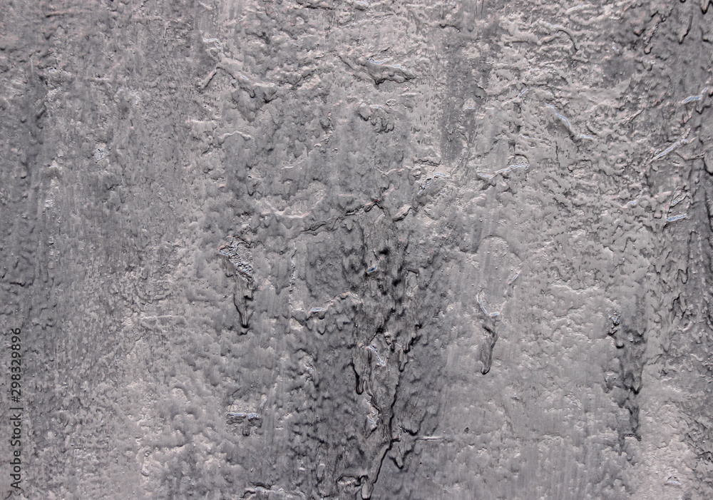 A painting defect. Closeup of sagging silver paint A painting defect. Closeup of sagging silver paint