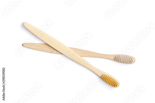 Two Bamboo toothbrushes on white background. Dental care