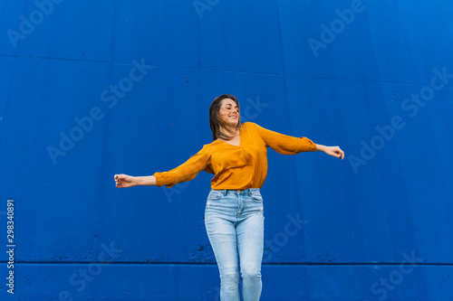 Barcelona, Spain Young beautiful carefree woman outdoors Beautiful, carefree, energetic, funny, woman, business, outdoors, daytime, happy photo