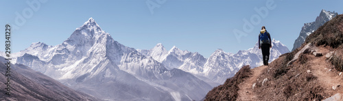 Young woman hiking in Sagarmatha National Park, Everest Base Camp trek, Nepal