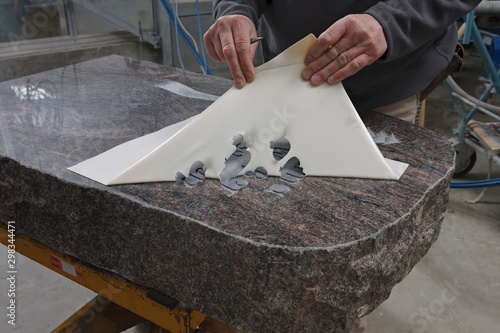 Germany, Stone mason manufacturing grave stone
