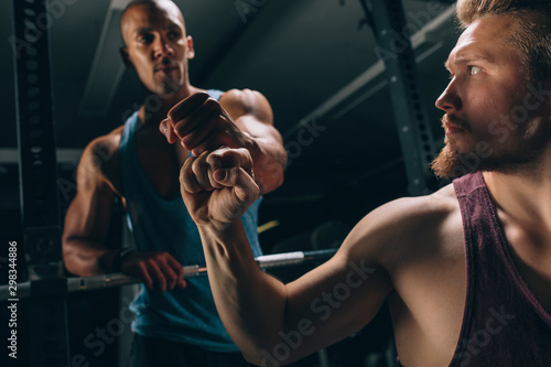 Two friends in a gym photo