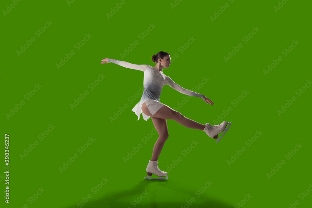 Figure skating girl isolated on green background. Figure skating girl isolated on green background.