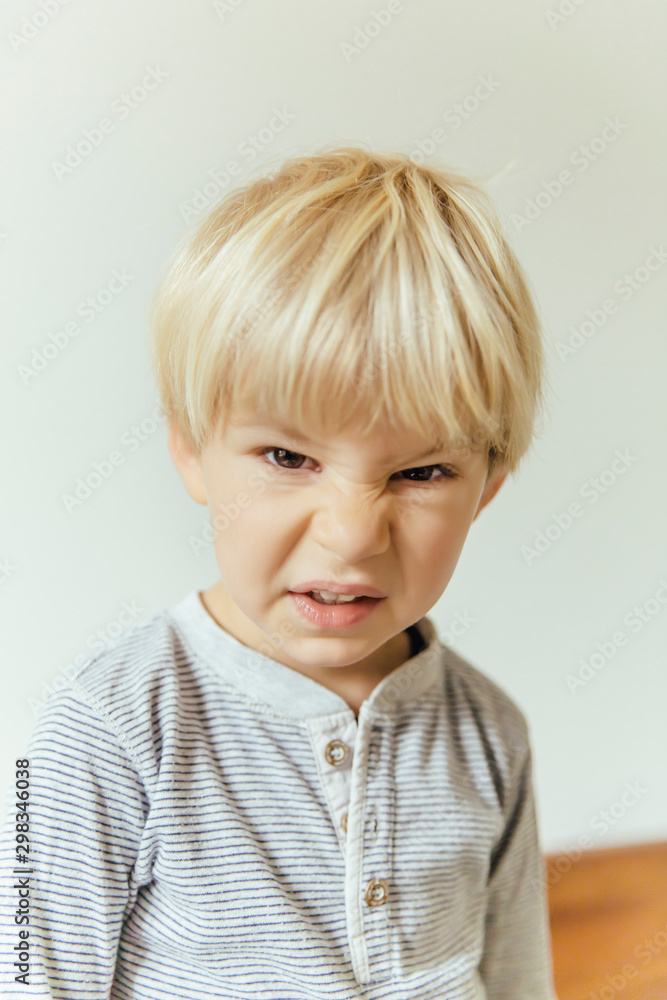 Little boy making a rabbit face Little boy making a rabbit face
