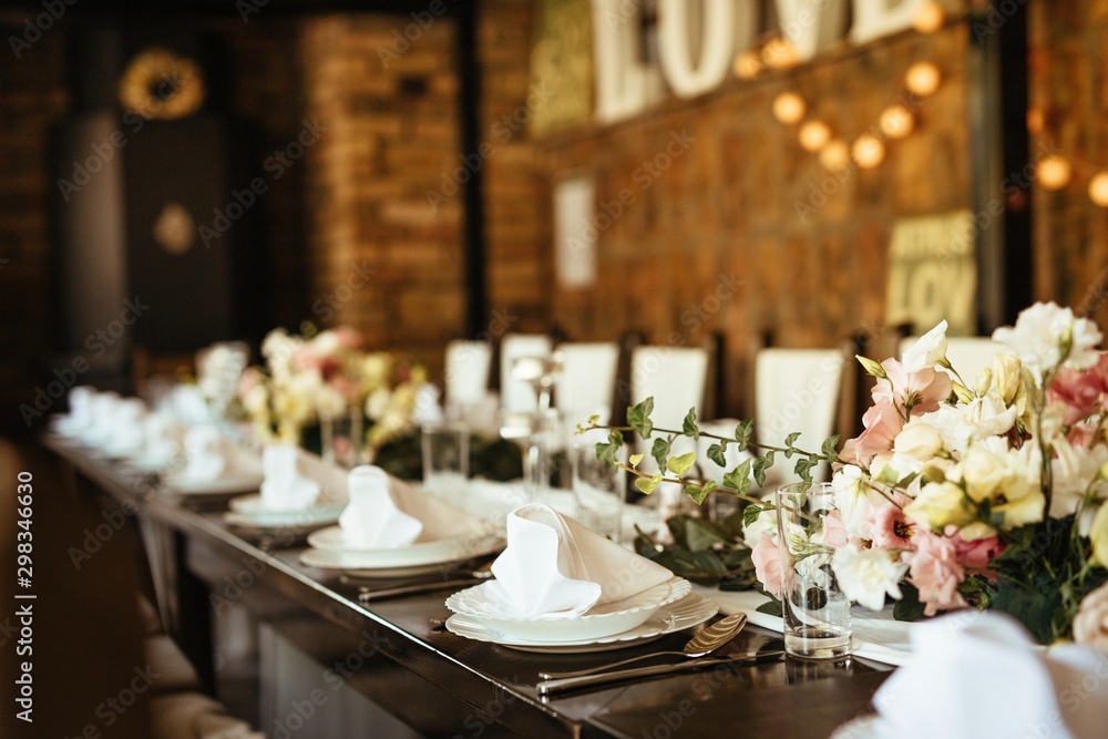 Arranged table set at wedding reception. - obrazy, fototapety, plakaty 