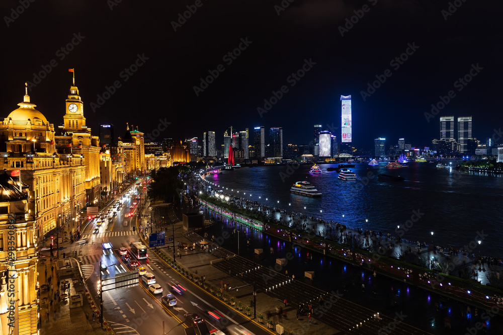 Shanghai China city centre skyline evening view combining old and new town buildings on the Bund boulevard promenade