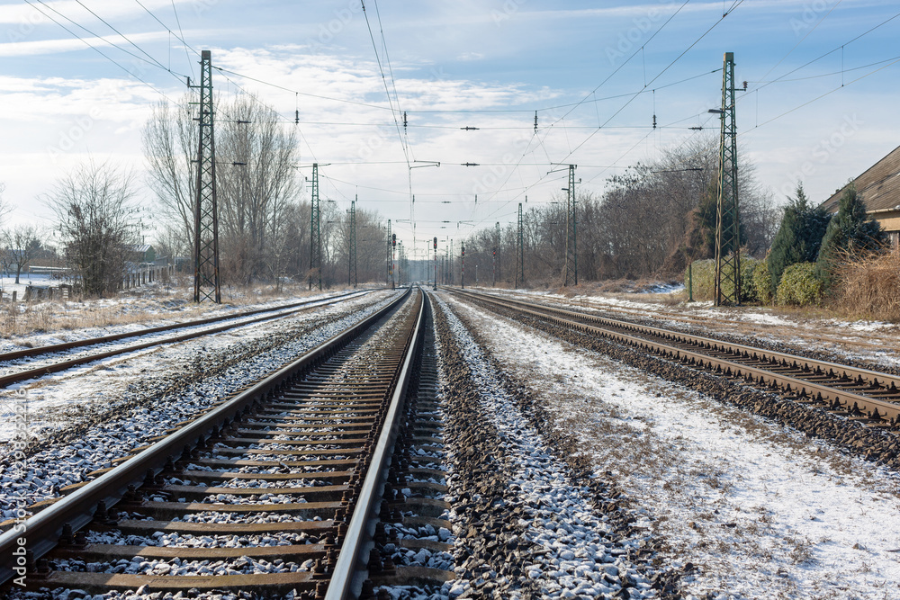 Railway tracks on winter day. Industrial landscape