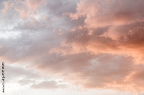 Clouds in the sky illuminated by the setting sun. © Игорь Салов