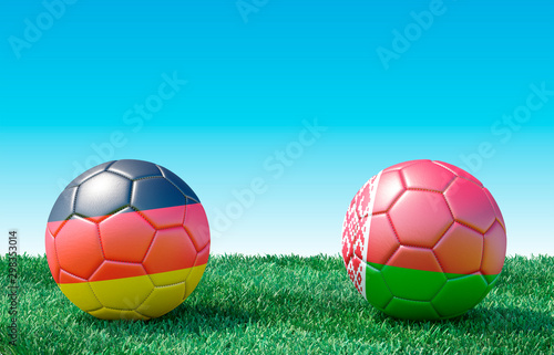 Two soccer balls in flags colors on green grass. Germany and Belarus. EURO 2020. Group C. 3d image