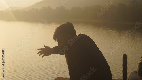 Obraz na plátně boy on riverscape