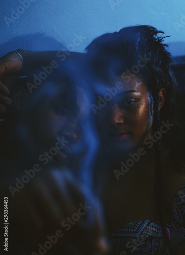 Portrait of young couple smoking cigarettes