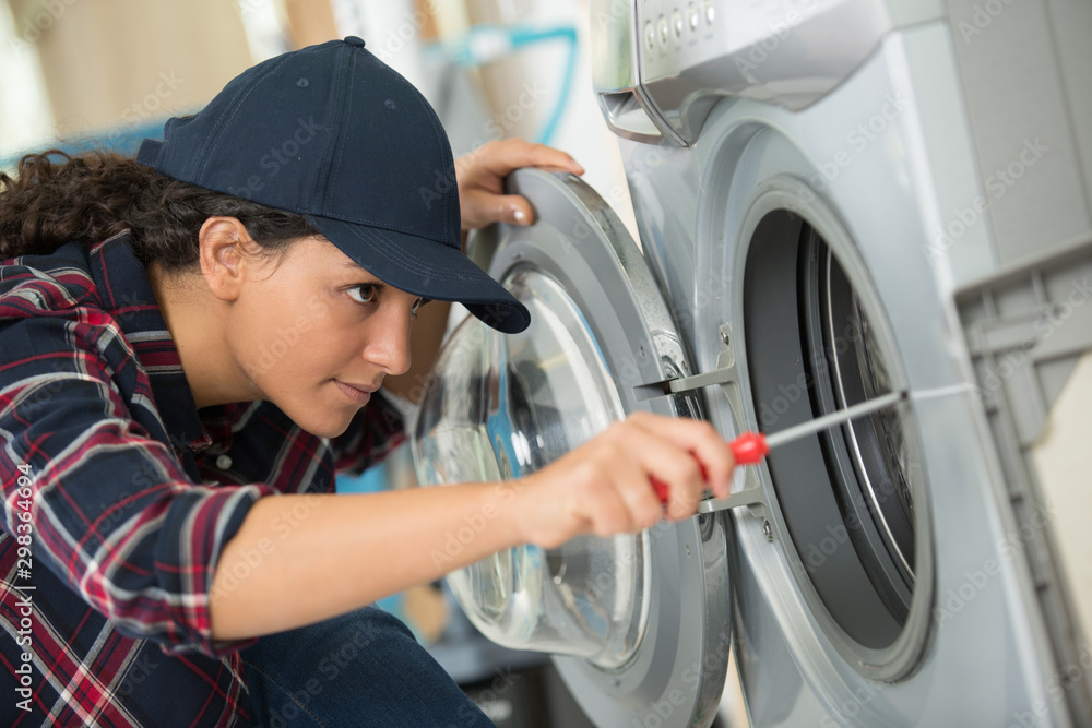 woman is screwing a washer woman is screwing a washer