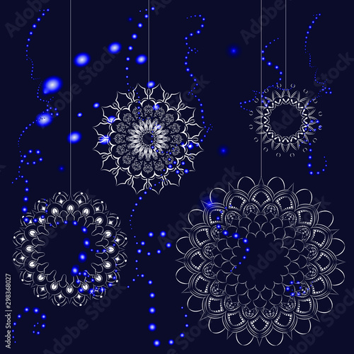 New year, garlands, glow, lights, snowflakes on a thread on a blue background. 