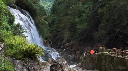 Tourists flock to Cat Cat Village in Northern Vietnam to get their photo taken next to the waterfall