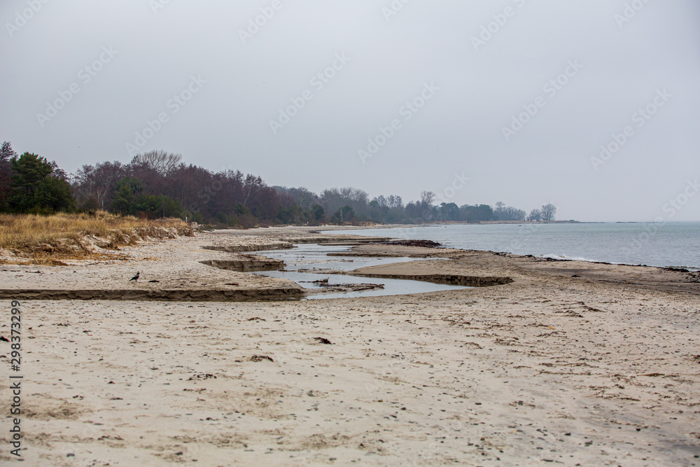 A deserted sandy beach a winter day