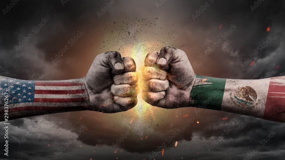 USA vs Mexico. Fists with flags. Battle of two countries on sky. - obrazy, fototapety, plakaty 