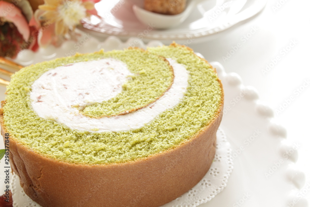 gourmet dessert, green tea Swiss roll on dish gourmet dessert, green tea Swiss roll on dish
