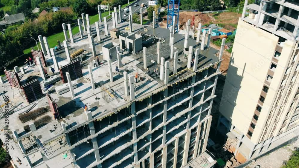 Concrete building is getting constructed in a top view Stock Video ...