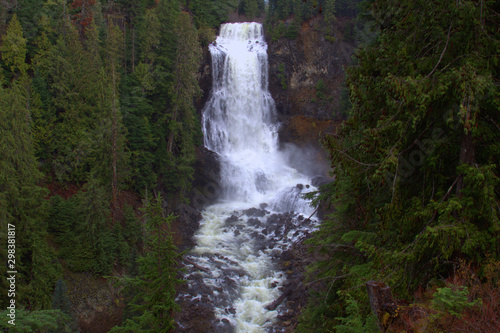 Rushing water down the mountain slopes create a beautiful water falls