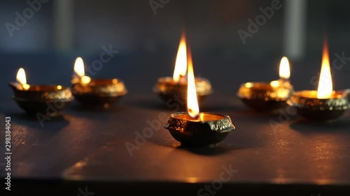 Metal Diyas lit up for the Indian Hindu festival of Diwali, the festival of lights.