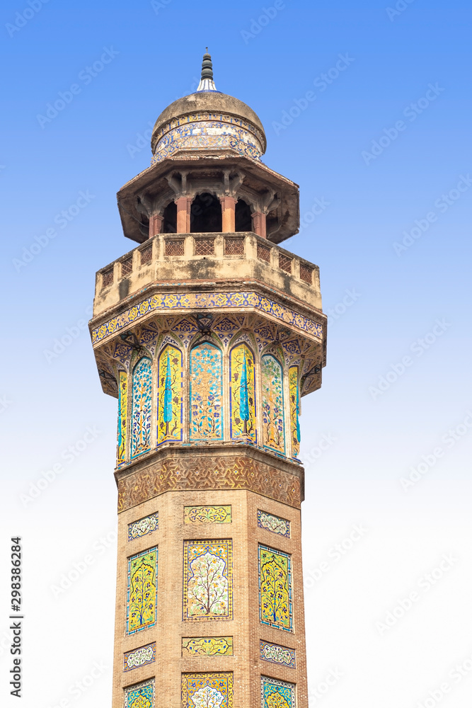 Minaret of the mosque and blue sky