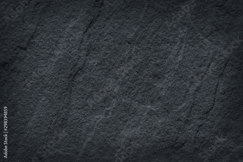 Dark grey stone / black slate stone background or texture