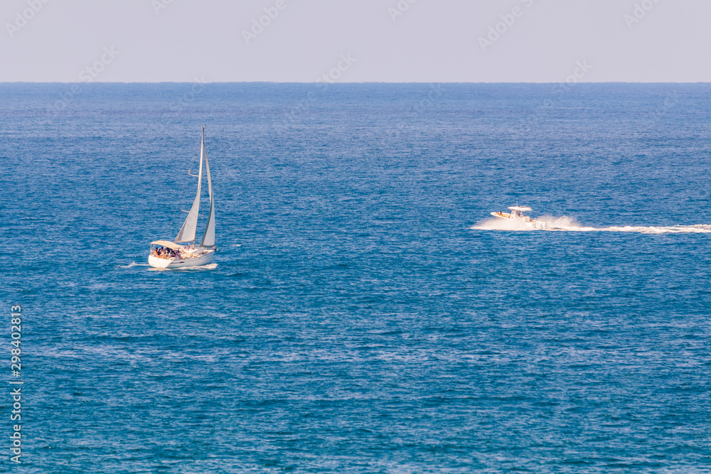 Fototapeta premium Two small white yachts on Mediterranean Sea