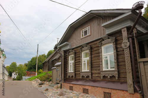 old wooden house on the street in small old russian town Plyos © Sergei Timofeev