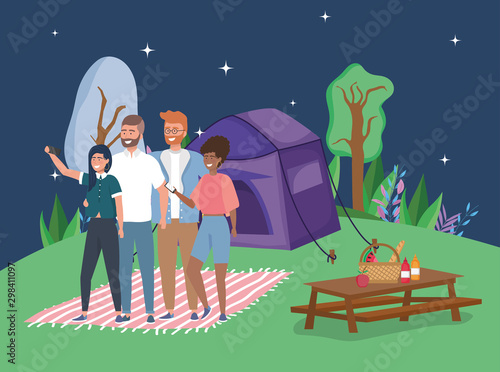 people taking selfie tent blanket camping picnic table night