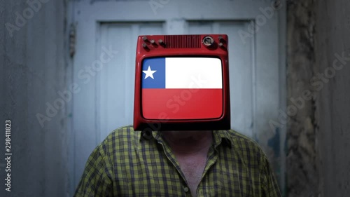 Flag of Chile in the TV Head of a Man. Chile Patriotism, Crisis and Protests Concept.  photo