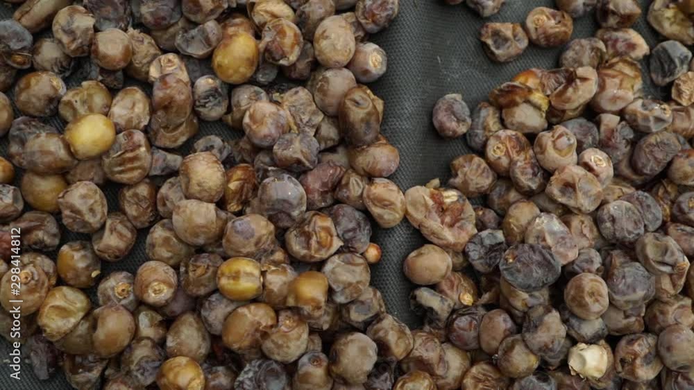 Dried date fruit rotates, background dates, close up. Food background. Organic food. Sunlights on many dates types . Dried date fruit rotates, background dates, close up. Food background. Organic food. Sunlights on many dates types .