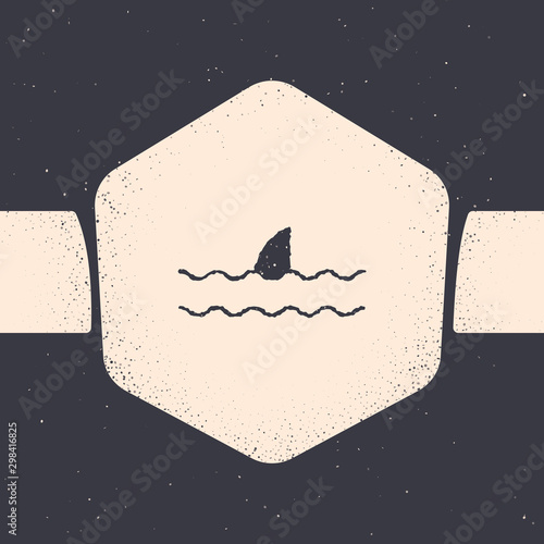 Grunge Shark fin in ocean wave icon isolated on grey background. Monochrome vintage drawing. Vector Illustration