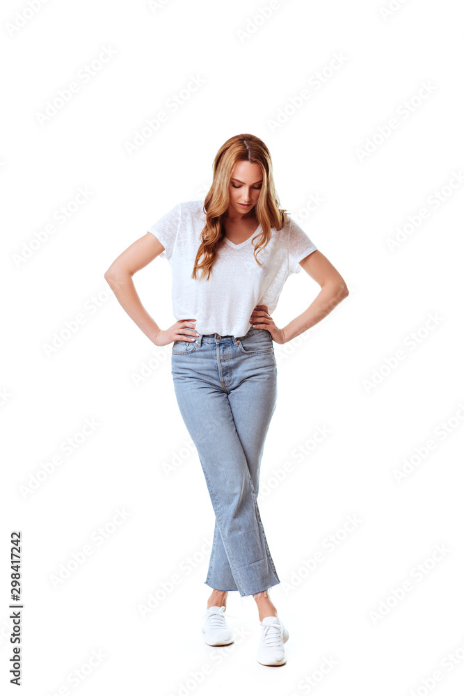 Portrait of a pretty smiling woman posing isolated on a white background Portrait of a pretty smiling woman posing isolated on a white background