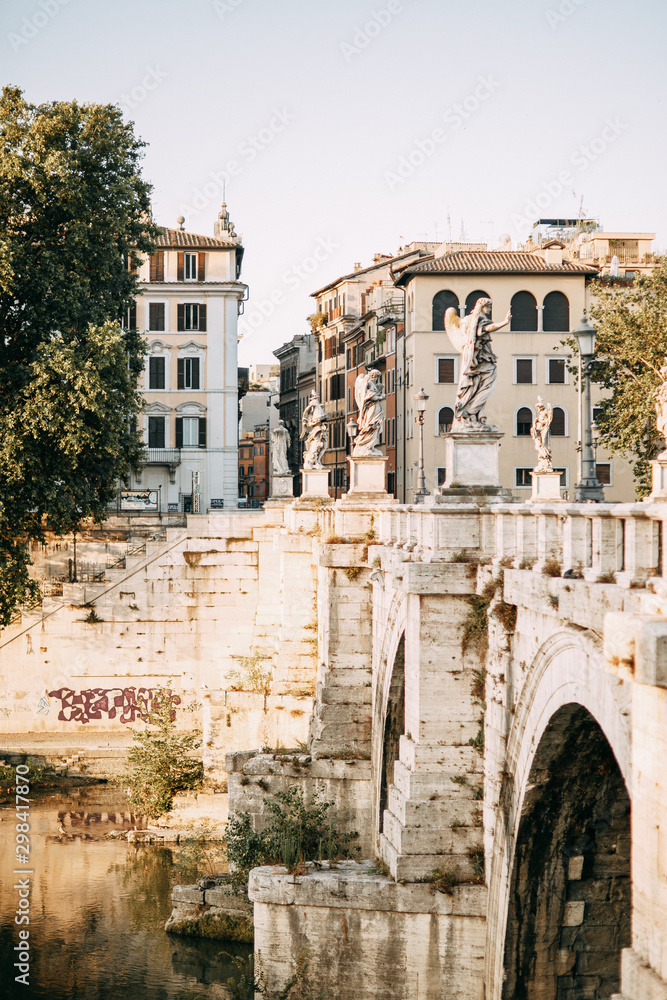 Sights and ancient places of Italy. Angel bridge in Rome at dawn.