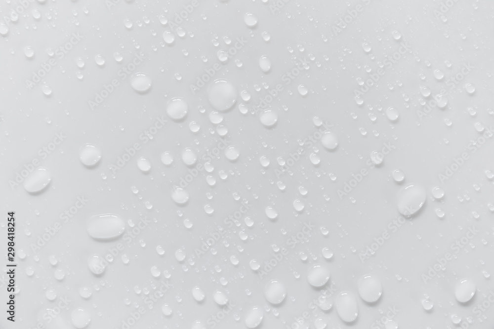 Raindrops on a grayish white background. Rainy season concept. Raindrops on a grayish white background. Rainy season concept.