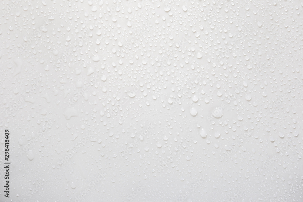Raindrops on a grayish white background. Rainy season concept. Raindrops on a grayish white background. Rainy season concept.