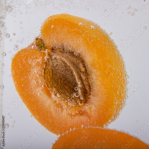 slice of fresh apricot in the water