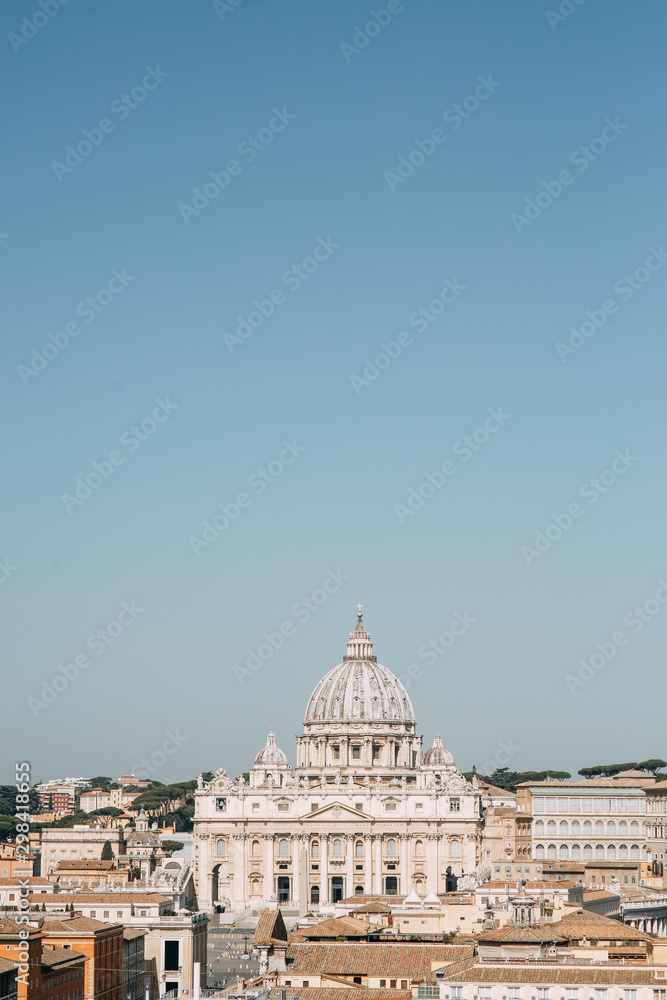  Panoramas and sights of Rome. The Vatican, St. Peter's Basilica at dawn.