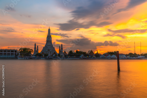 Beautiful Wat Arun Thai Temple at sunset scene in Bangkok, Thailand. The most famous Thailand tourist destination.