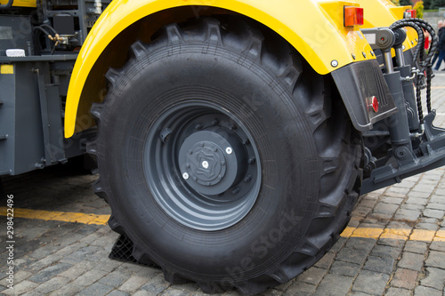 Wheel large rubber agricultural tractor. Mechanical engineering, agriculture, useful machines.