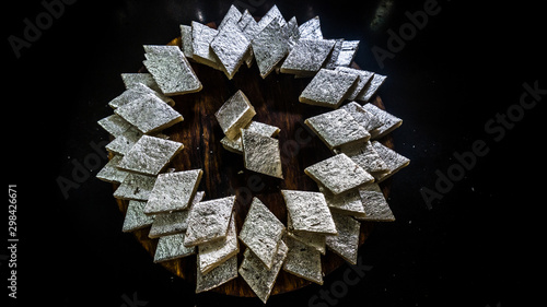 kaju katli also known as kaju katri is an Indian sweet specially made for Diwali. Diwali is biggest festival of India photo