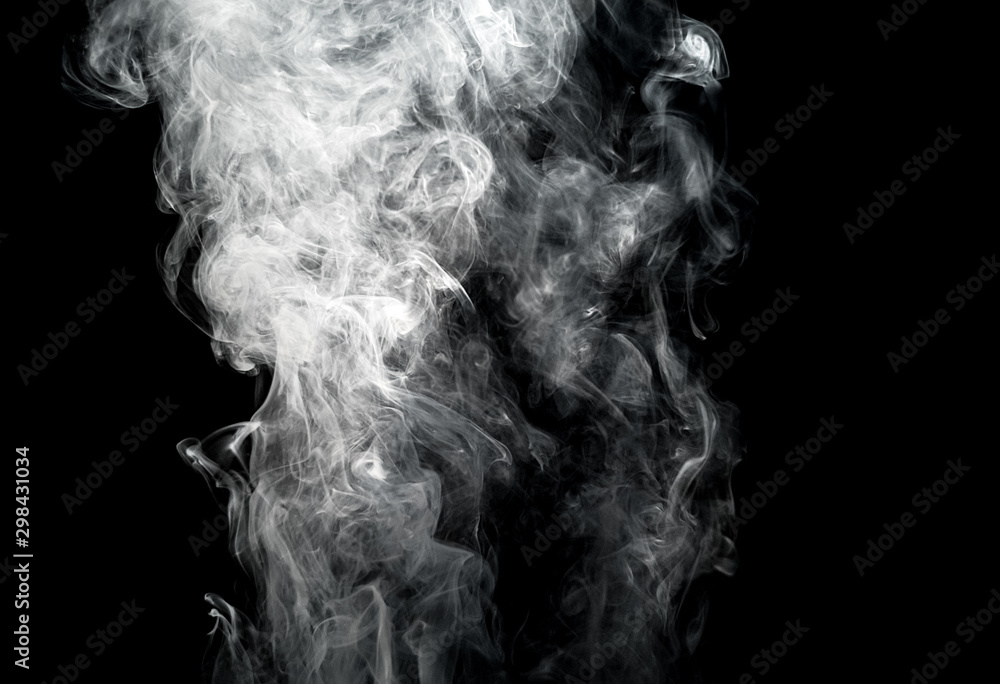 Blurred of white smoke movement over dark background for your abstract design. Blurred of white smoke movement over dark background for your abstract design.