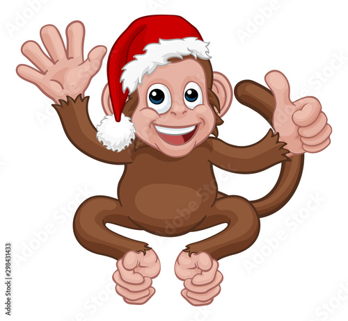 A Christmas monkey animal cartoon character in a Santa hat giving thumbs up and waving