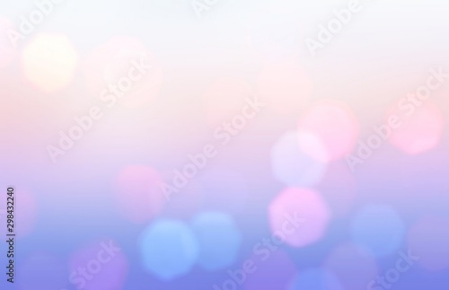 Bokeh lilac pink blue wonderful pattern. Cool abstract background. Holiday garland lights. Fantasy sky blurred texture.