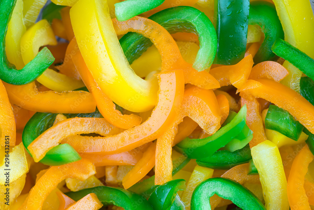 Sliced pepper. Slices of yellow and green bell peppers Sliced pepper. Slices of yellow and green bell peppers