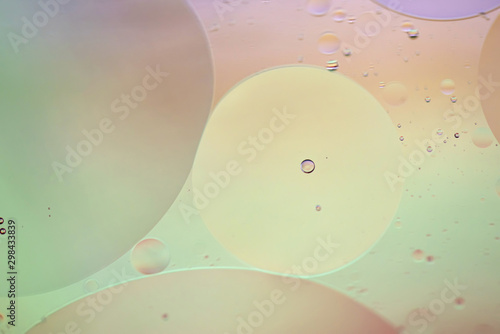 Defocused pastel colored abstract background picture made with oil  water and soap